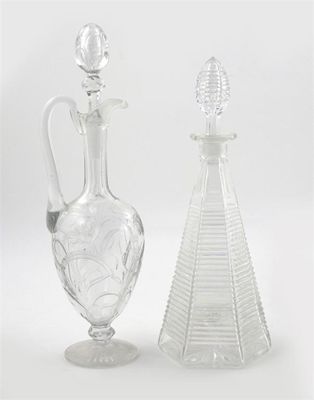 Appraisal: A cut glass claret jug and stopper cut with flower