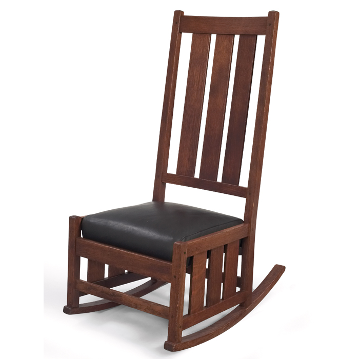 Appraisal: Gustav Stickley sewing rocker high-back form three vertical slats at