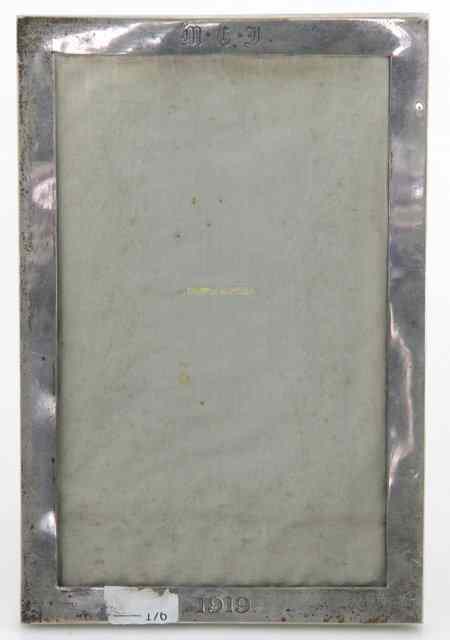 Appraisal: A silver photograph frame Mappin Webb Birmingham initialed M E