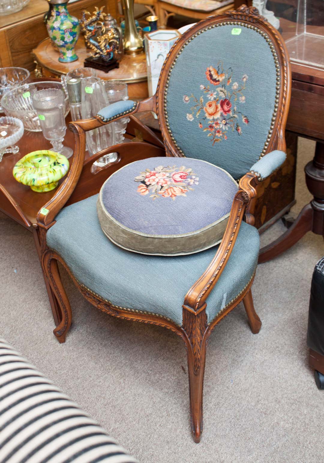 Appraisal: Louis XV needlepoint upholstered armchair cameo back floral needlepoint upholstery