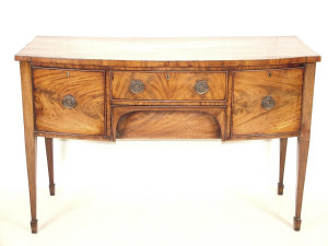 Appraisal: A George III mahogany bowfront sideboard circa with central drawer