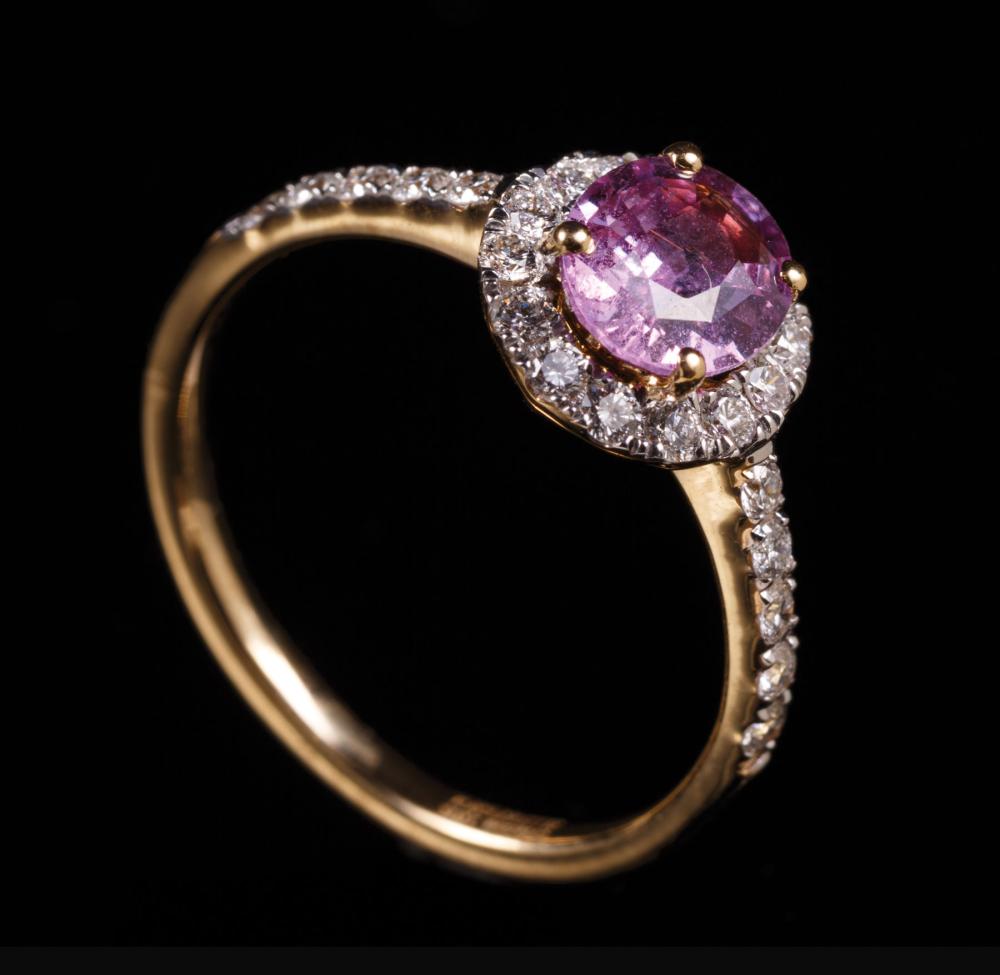 Appraisal: kt Yellow Gold Purple-Pink Sapphire and Diamond Ring center prong