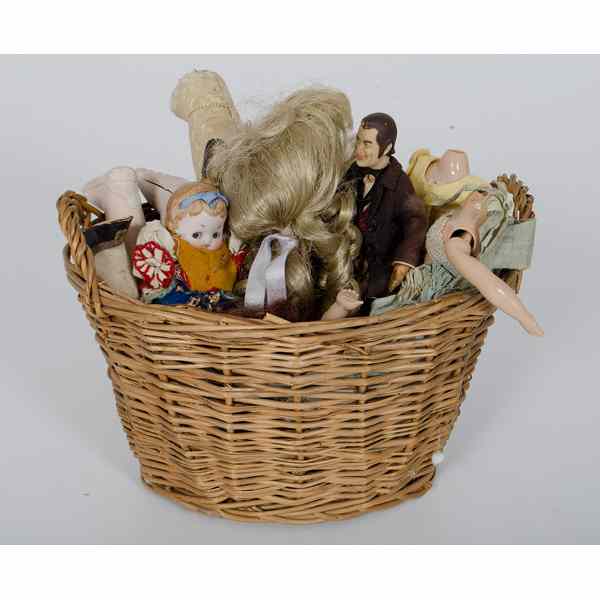 Appraisal: Assorted Doll Parts Basket with various doll pieces including three