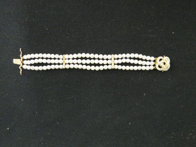 Appraisal: Diamond Pearl Bracelet triple strand with fancy K clasp having