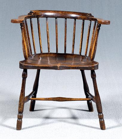 Appraisal: British Windsor armchair yoke-form back spindle supports deeply shaped plank