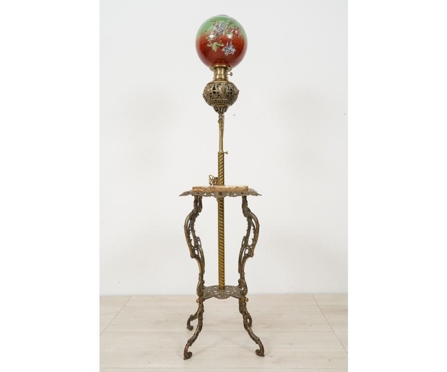 Appraisal: Victorian ornate brass adjustable piano parlor lamp with red globe