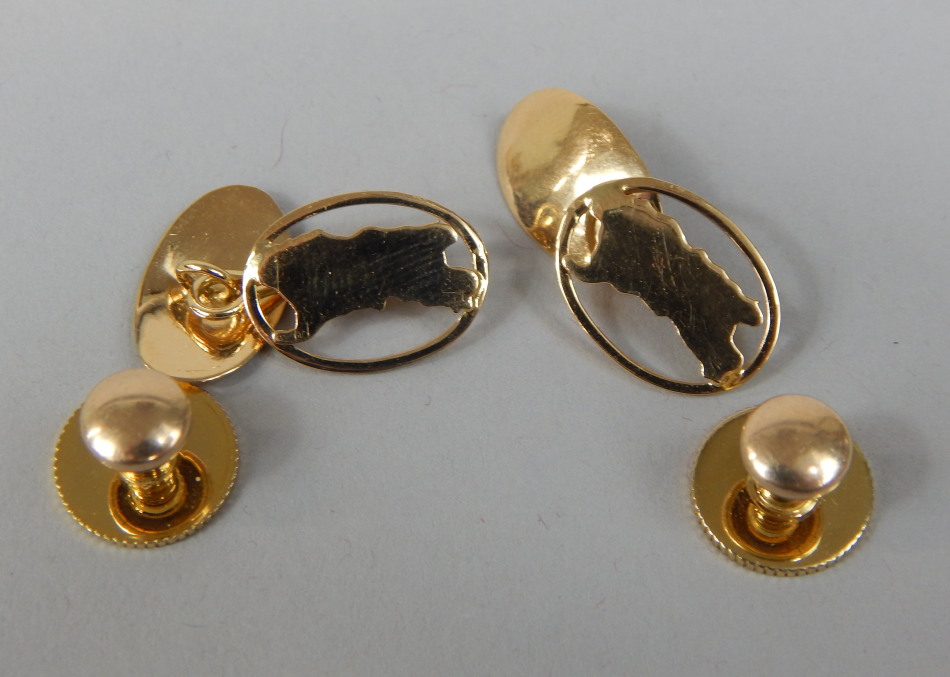 Appraisal: A pair of gold cufflinks and two studs the cufflinks