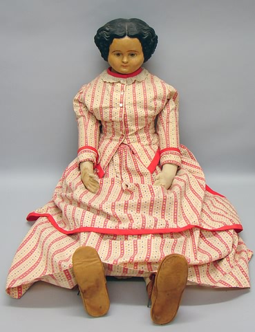 Appraisal: Unmarked Greiner type papier mache doll Shoulderhead has been repaired