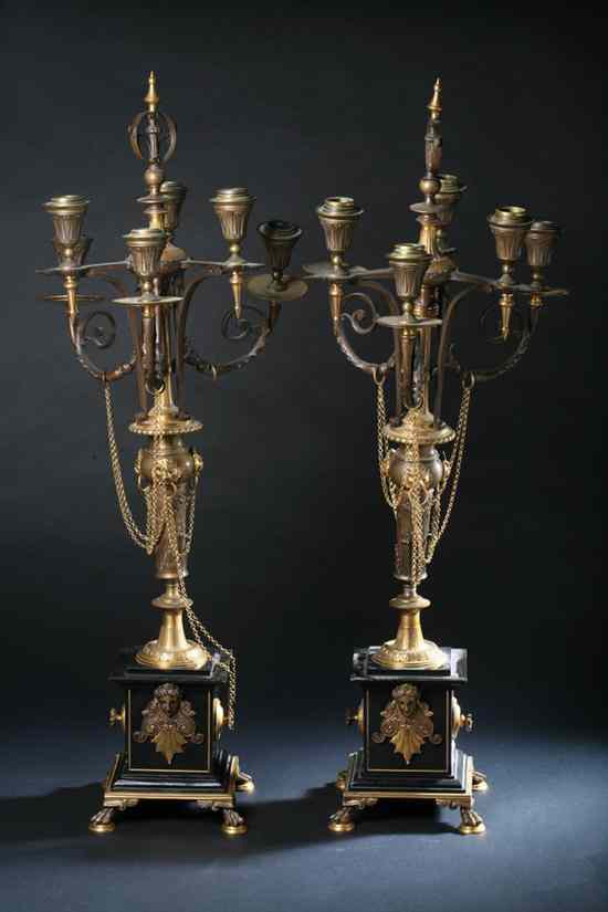 Appraisal: PAIR FRENCH EMPIRE-STYLE BRONZE-DOR AND BLACK MARBLE SIX-LIGHT CANDELABRA late