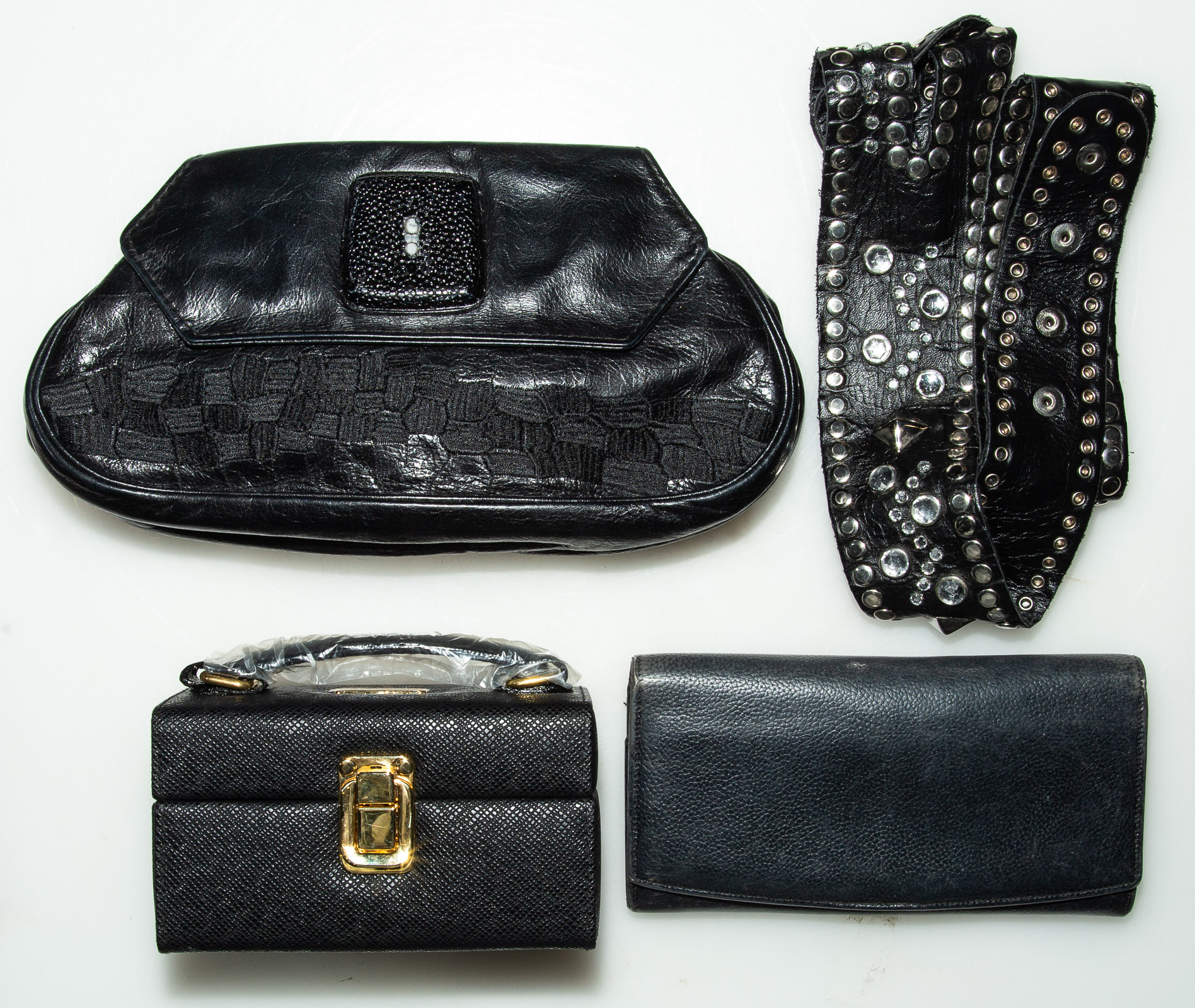 Appraisal: FOUR BLACK LEATHER OTHER ACCESSORIES leather including a Coach wallet