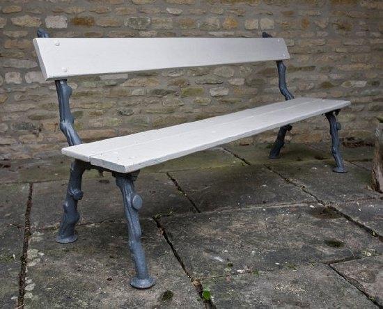 Appraisal: A th Century English garden bench with cast rustic branch