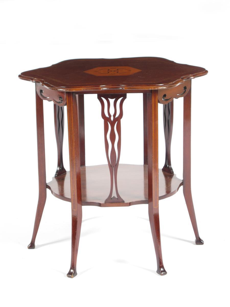 Appraisal: A Mahogany occasional table