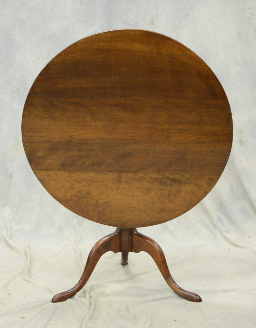 Appraisal: Cherry Queen Anne tilt top tea table baluster turned stem