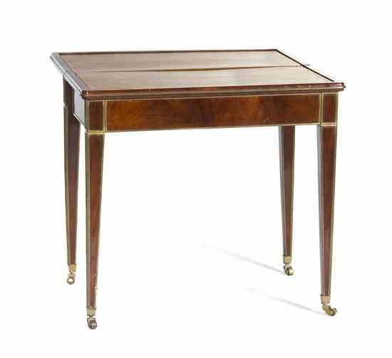 Appraisal: A Russian Neoclassical Mahogany and Gilt Metal Mounted Games Table