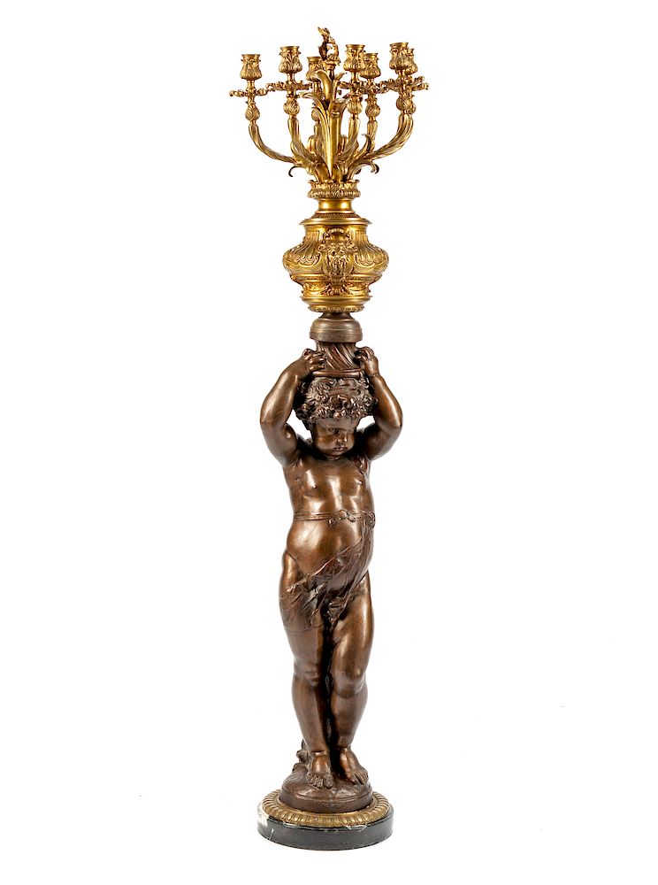 Appraisal: A French Gilt Metal and Patinated Iron Seven-Light Candelabrum A