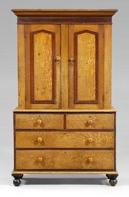 Appraisal: British grain-painted linen press pine throughout with bold oak and