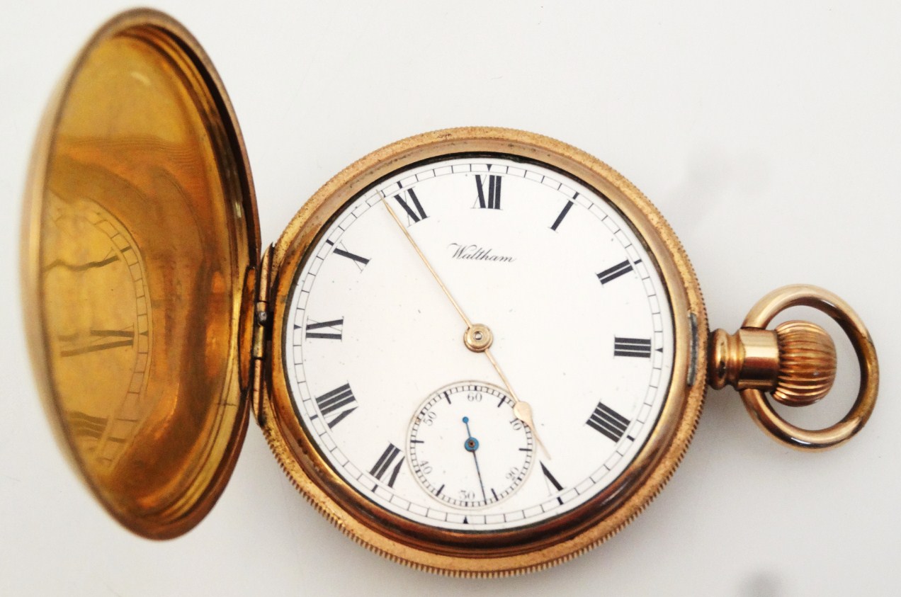 Appraisal: A gentleman's hunter pocket watch the engine turned case hinging