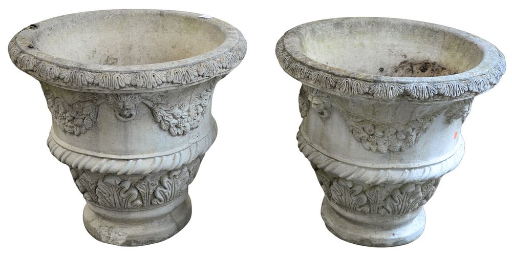 Appraisal: Pair of Concrete Urns or Outdoor Planters having mask and