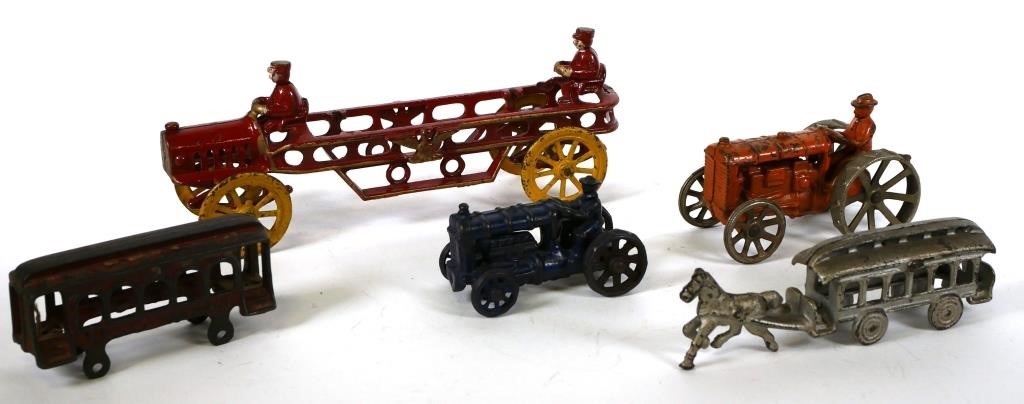 Appraisal: FIVE ANTIQUE CAST IRON TOYSFive toys including trolley with no