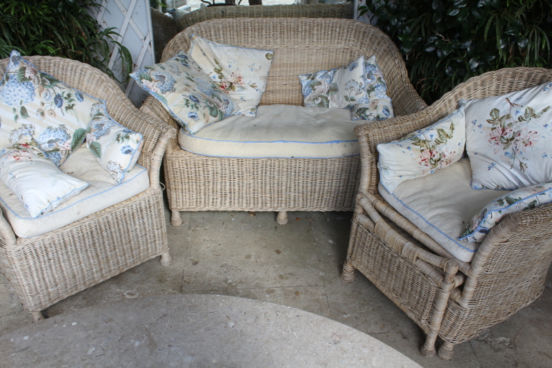 Appraisal: A Lloyd Loom style wicker conservatory three piece suite in