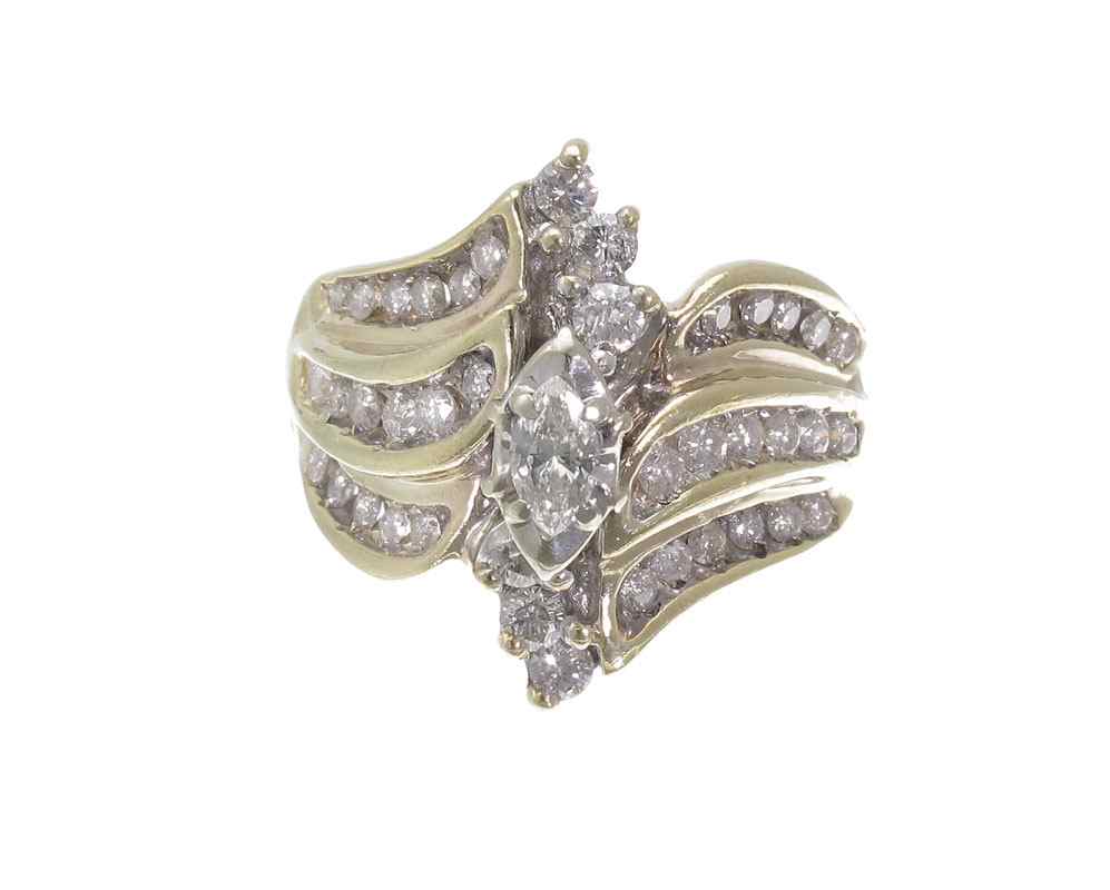 Appraisal: CT DIAMOND RING K yellow gold ring contains one marquise