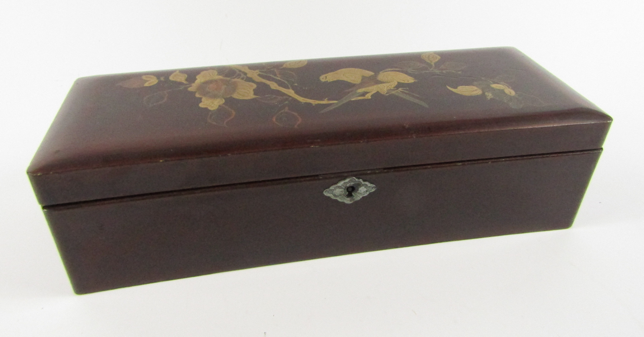 Appraisal: A Japanese late thC red lacquer glove box decorated with