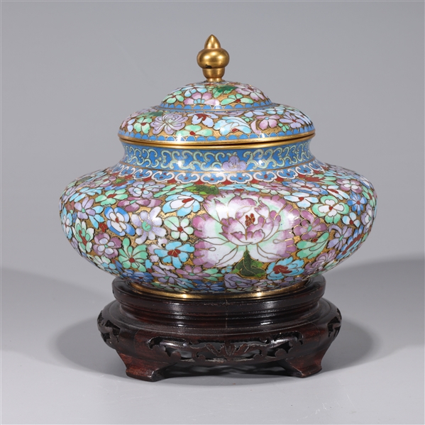 Appraisal: Chinese cloisonne enameled covered vessel with floral designs and wood