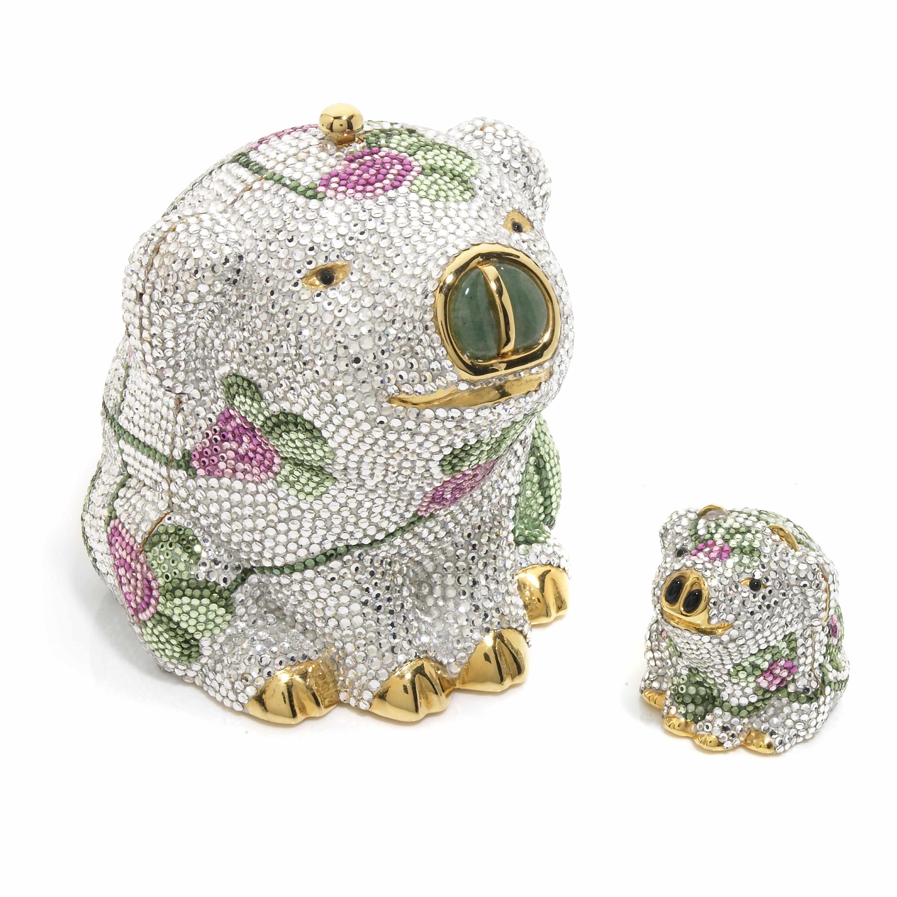 Appraisal: A silver crystal pig minaudiere with pink flowers and a