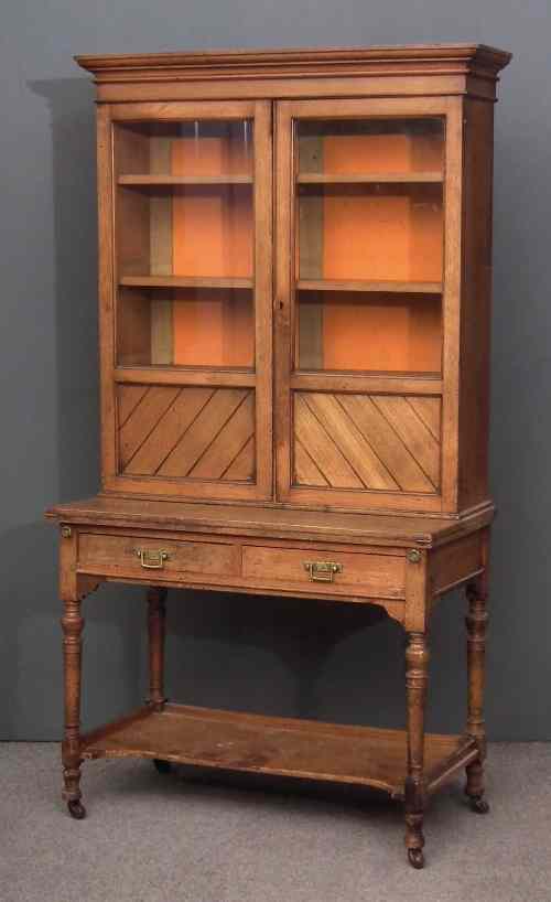 Appraisal: A late Victorian ash Secretaire bookcase of unusual design the