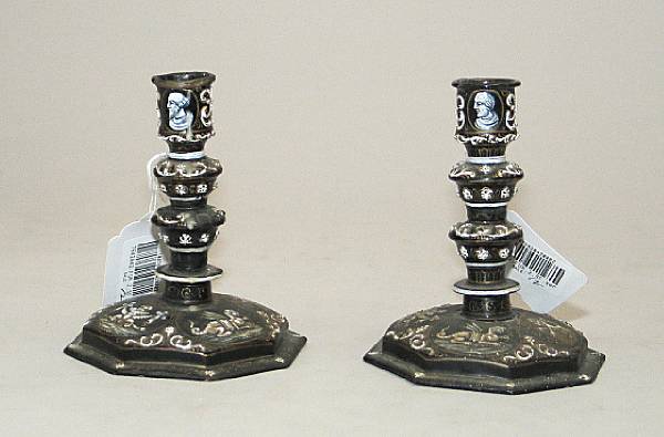 Appraisal: A pair of Limoges enamel candlesticks in the Louis XIV