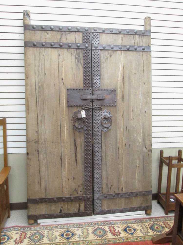 Appraisal: PAIR OF MONGOLIAN GARDEN GATE DOORS hardwood plank construction with