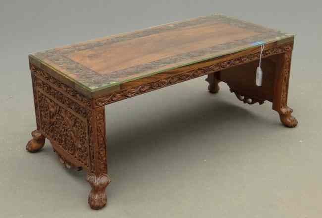 Appraisal: Carved Asian coffee table with brass mounts Top '' x