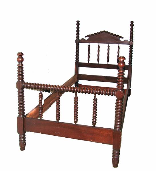 Appraisal: A pair of Victorian spool-turned twin bedsteads height ft in