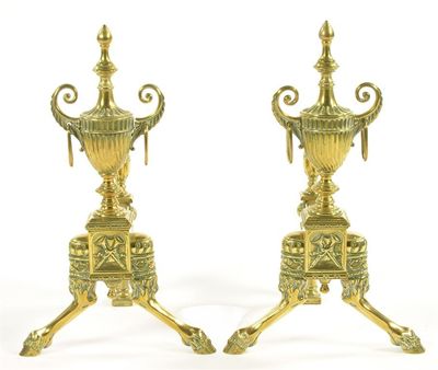 Appraisal: A pair of late Victorian brass andirons the fluted urn