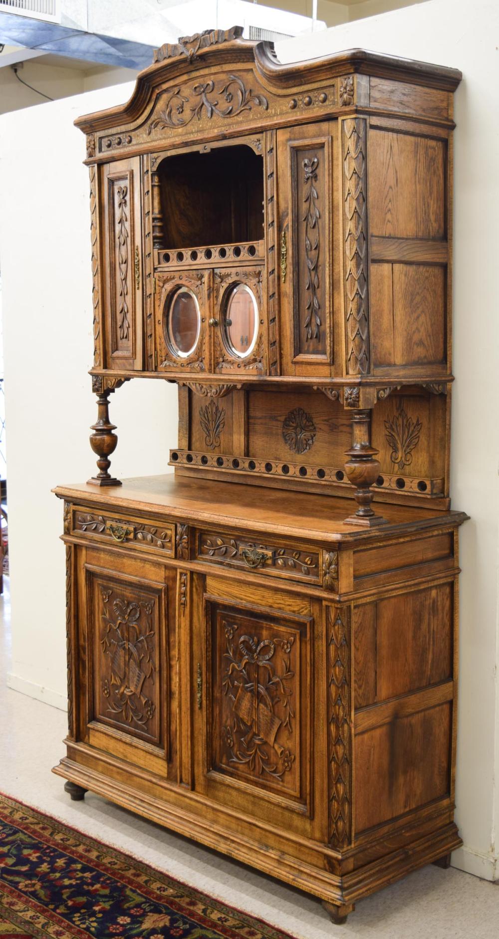 Appraisal: ANTIQUE CARVED OAK SIDEBOARD Continental c in two stacking sections