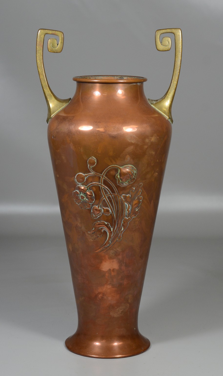 Appraisal: WMF Art Nouveau brass and copper vase with repousse flowers