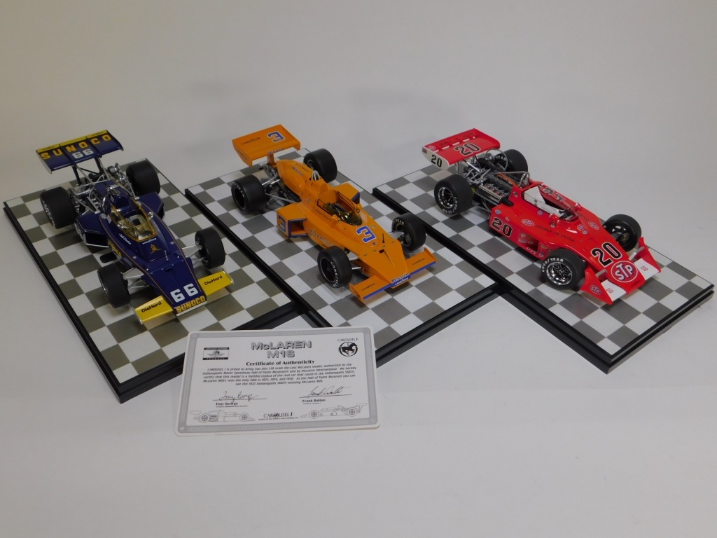 Appraisal: PC CAROUSEL INDY MCLAREN DIECAST CAR MODELS Includes three scale