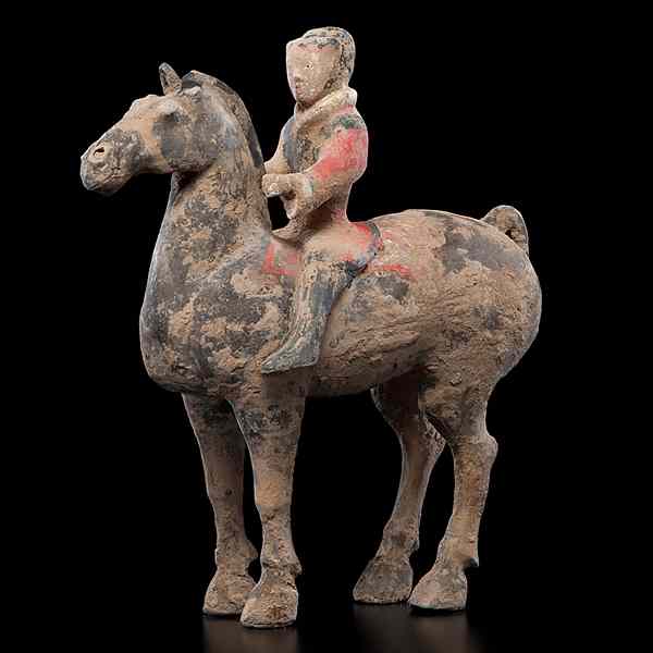 Appraisal: Han-Style Tomb Figure Chinese A Han-style tomb figure riding a