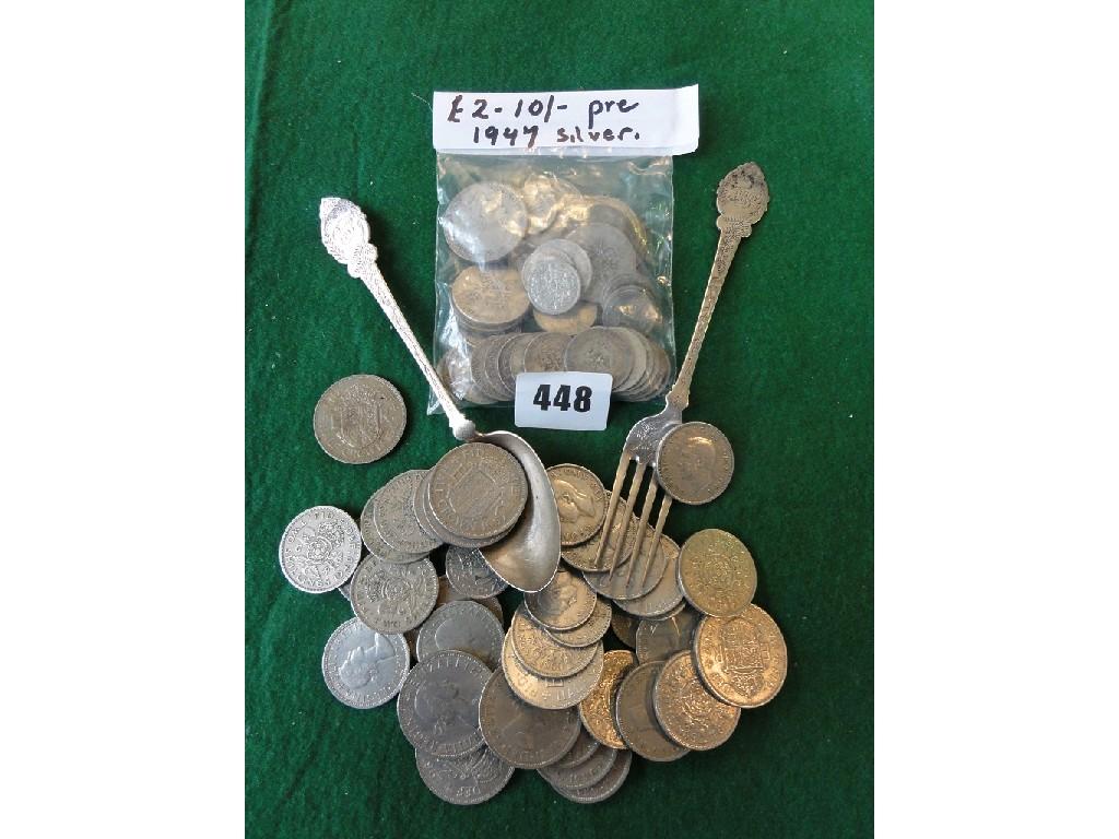 Appraisal: Two pounds shillings of pre silver currency silver spoon and