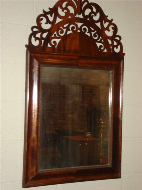 Appraisal: EMPIRE STYLE MAHOGANY MIRROR the rectangular mirror plate enclosed in