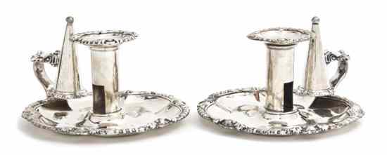 Appraisal: A Pair of Sheffield Plate Chambersticks Matthew Boulton having shell