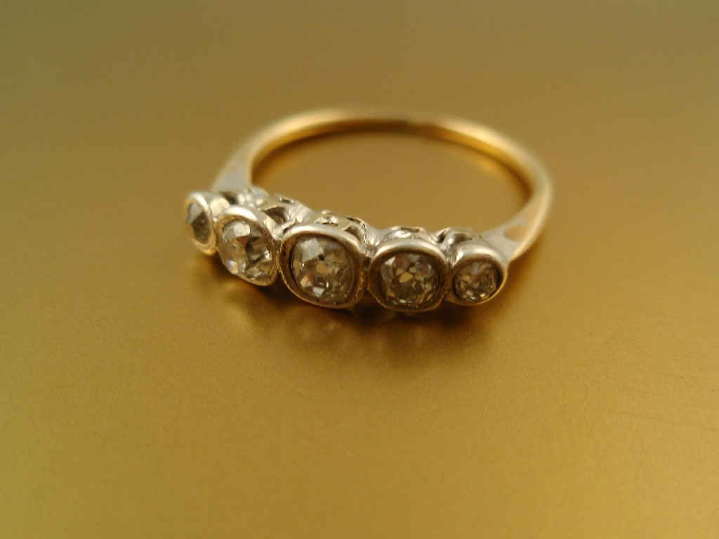 Appraisal: A five stone diamond set half hoop ring old cut