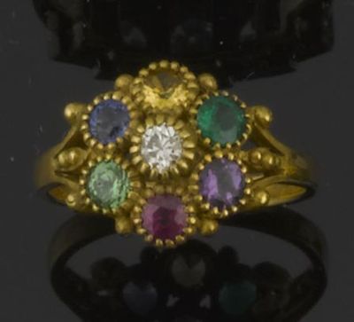 Appraisal: A gem set DEAREST cluster ring Set in gold Size