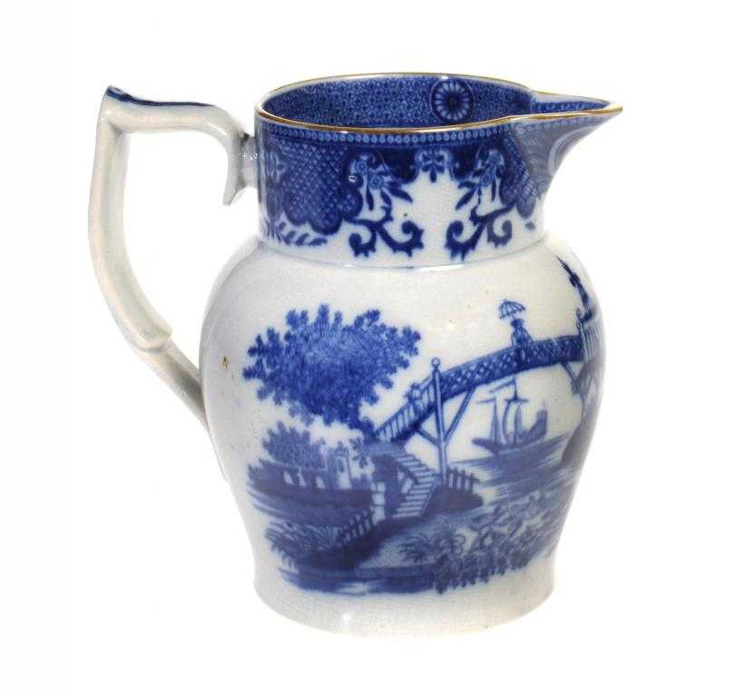 Appraisal: A BLUE PRINTED PEARLWARE CLASSICAL FIGURES PATTERN JUG the rim