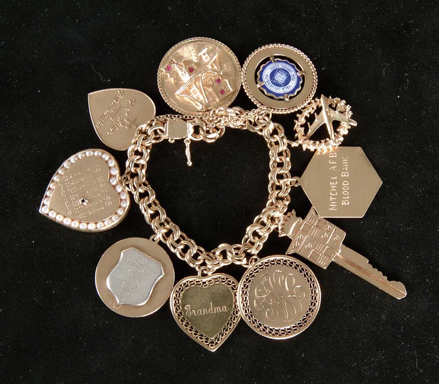 Appraisal: K GOLD CHARM BRACELET Outstanding charm bracelet has heavy multi-link