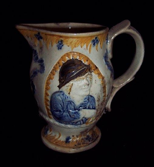 Appraisal: An early th Century Staffordshire jug painted window portraits of