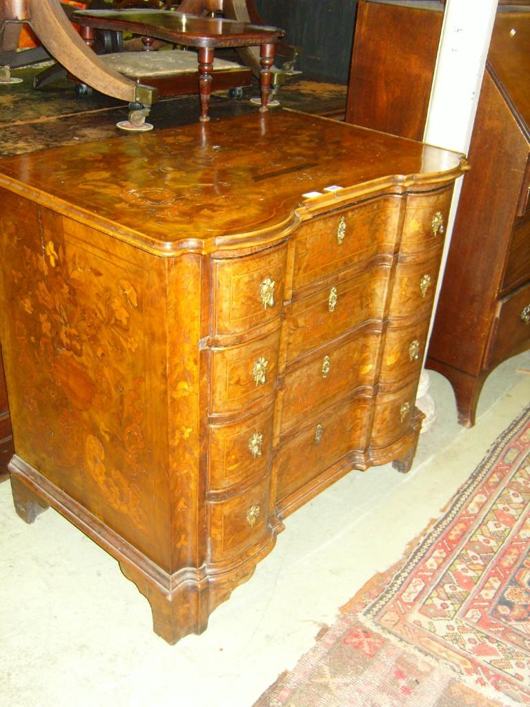 Appraisal: An th century Dutch floral marquetry chest the serpentine front