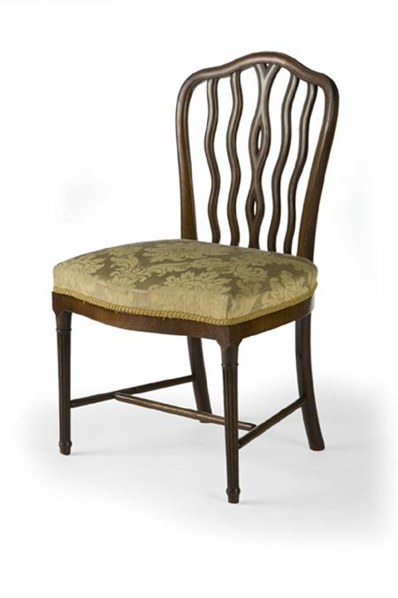 Appraisal: An unusual late George III mahogany dining chair In the