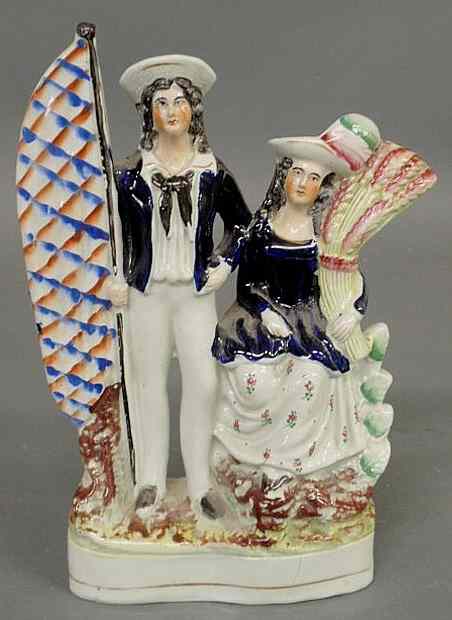 Appraisal: Staffordshire figure of a sailor and his girl th c