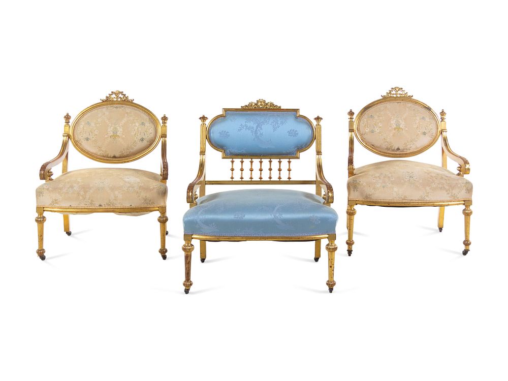 Appraisal: Three Louis XVI Style Carved Giltwood Fauteuils Three Louis XVI